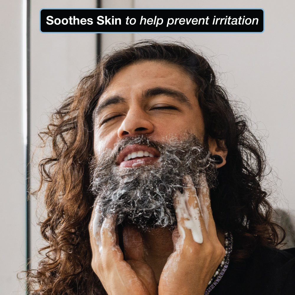Model lathering beard with soothing beard shampoo