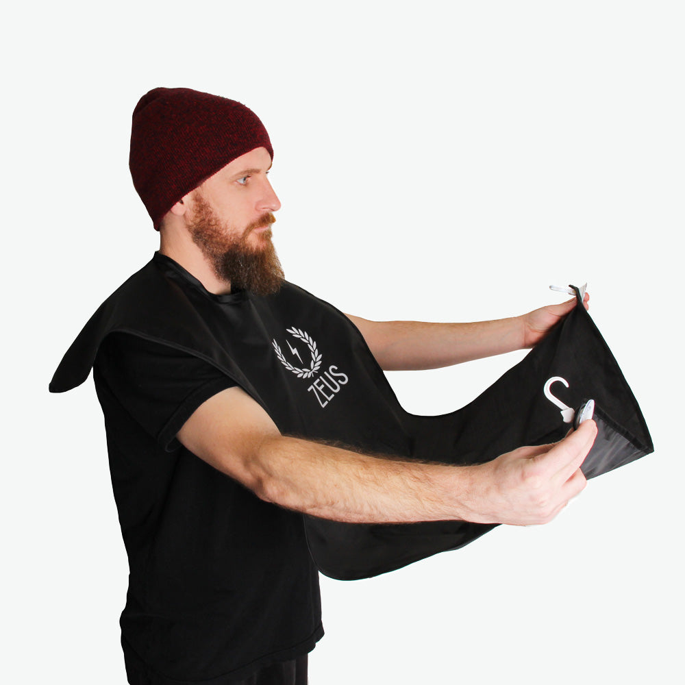 Model wearing Zeus Facial Hair Trimming Catcher Bib Beard Apron