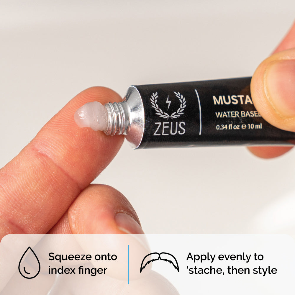 Squeezing mustache wax onto finger