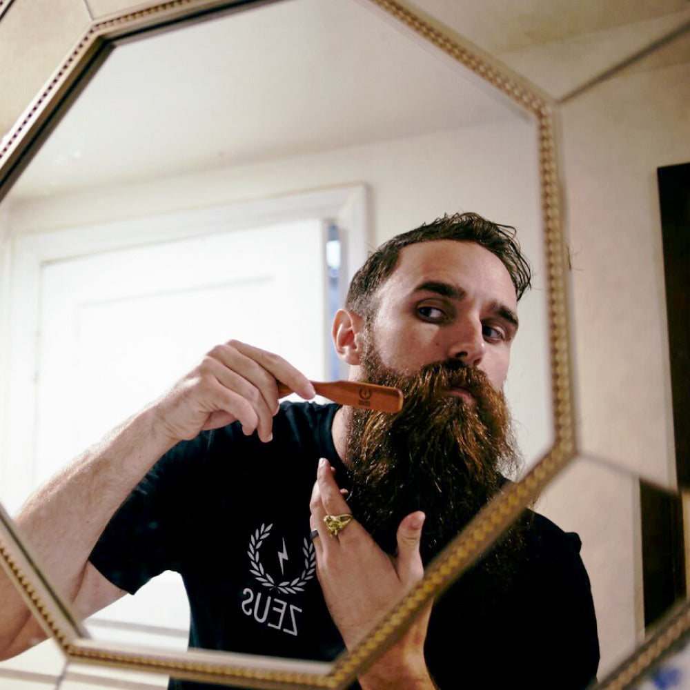 Zeus handle beard brush in use