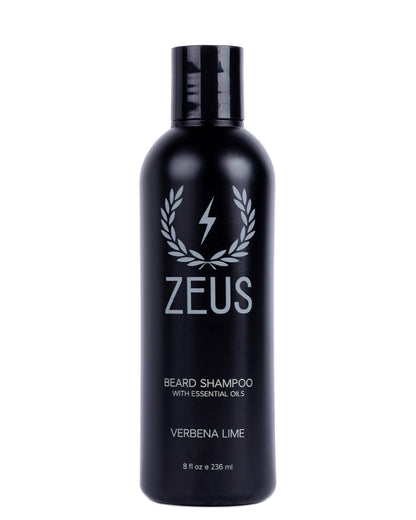 A black bottle of Zeus Beard Shampoo with essential oils, Verbena Lime scent, on a solid white background.