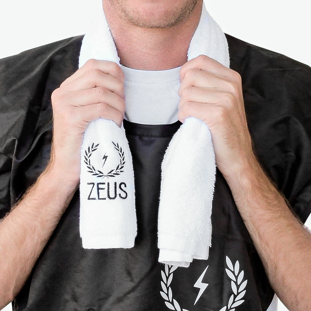 Model drapes Zeus Cotton Steam Towel over neck