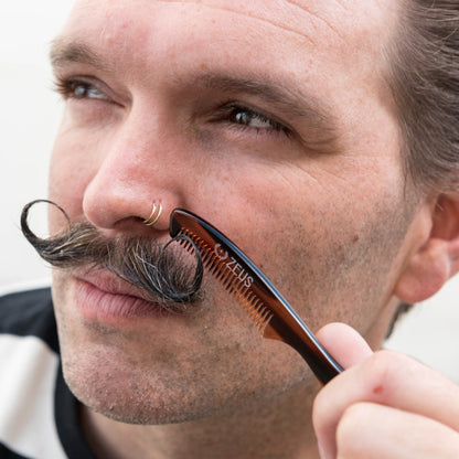 Model using Zeus Large Mustache Comb
